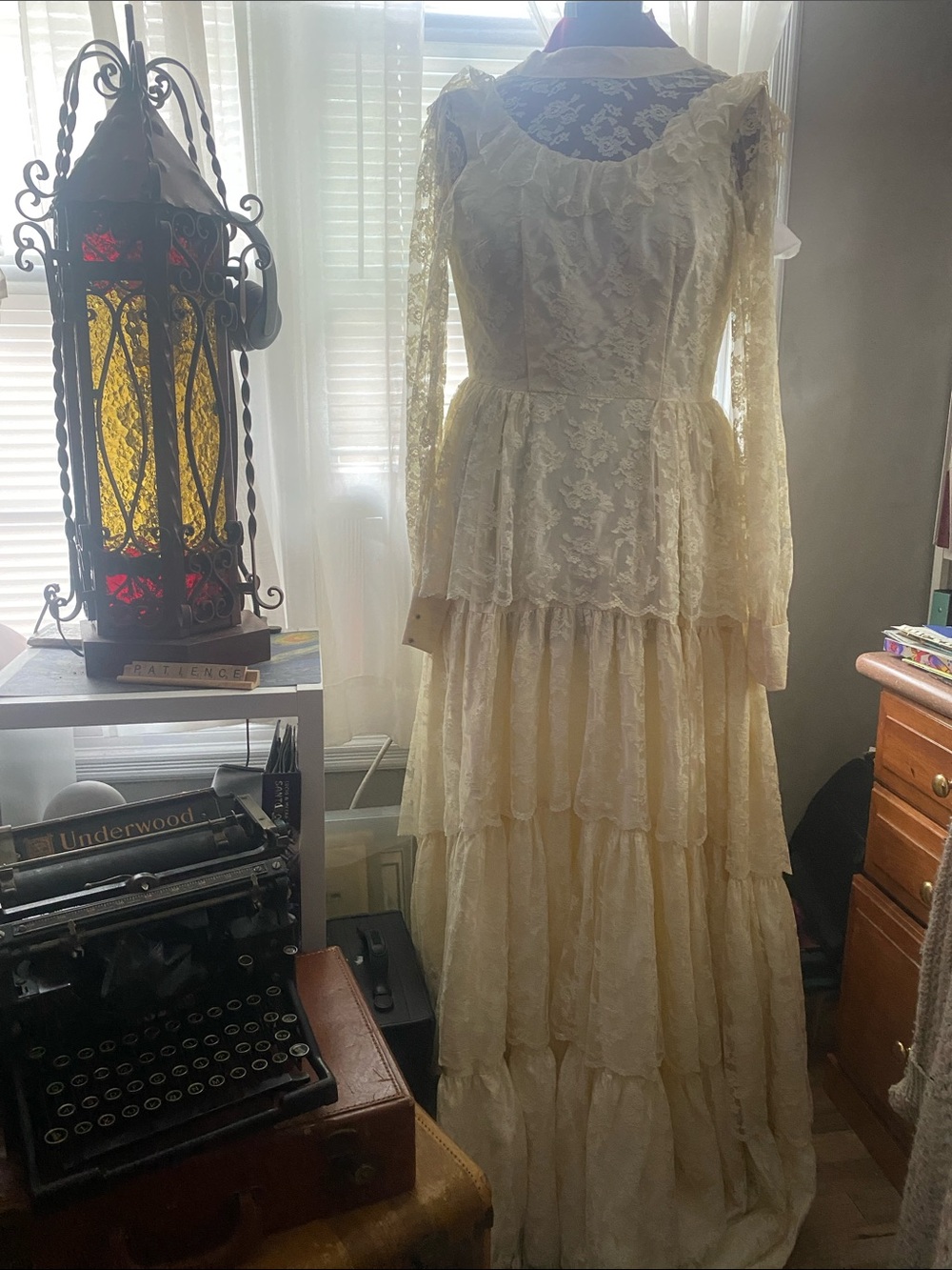 Romantic Vintage Style cream lace wedding dress, likely from the 1960s or 1970s